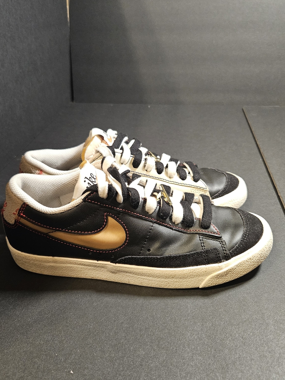 Nike  Blazer Low 77  Black & Gold Low-Top Sneakers